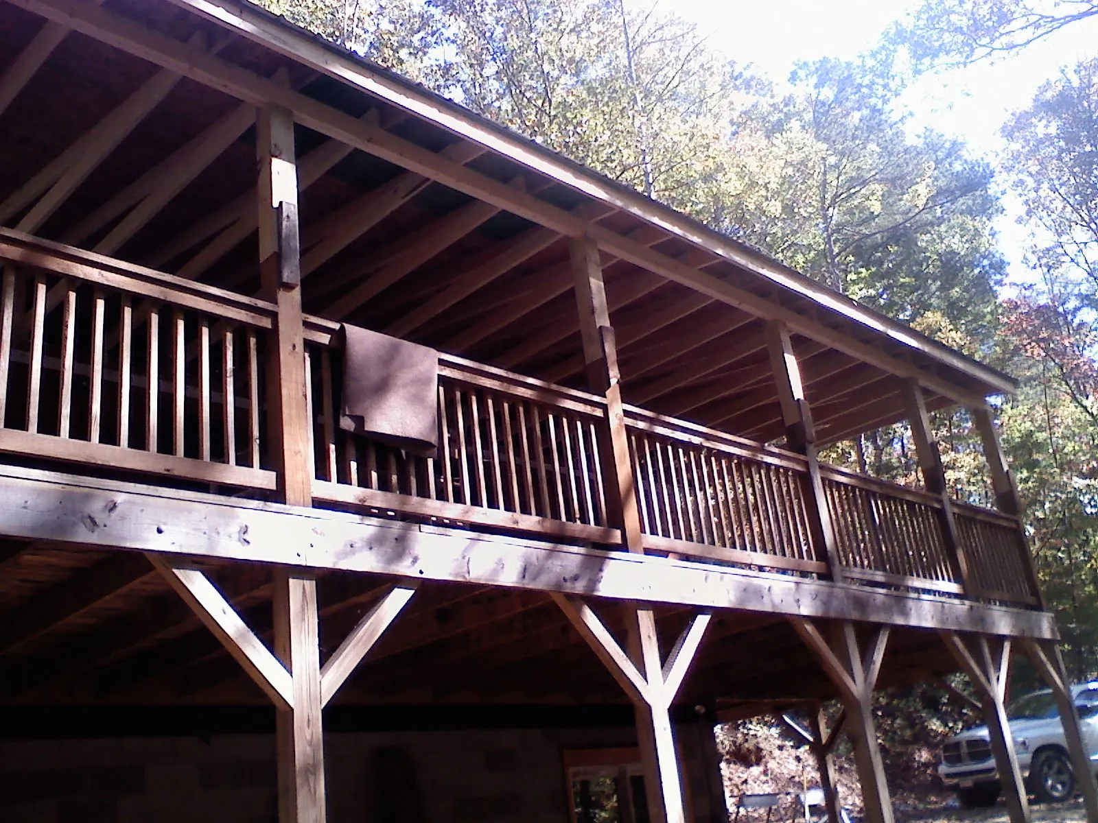 Timber framing under a new elevated porch and deck — Roof Leak Repair in Bourbon by Roofing Brothers